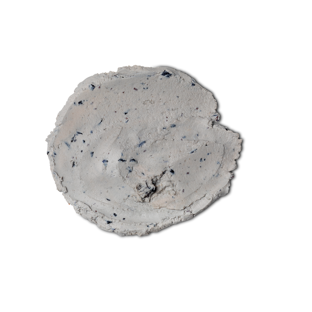 A swatch of thick, pale lilacy blue coloured Catastrophe Cosmetic face mask, complete with tiny pieces of blueberry throughout.